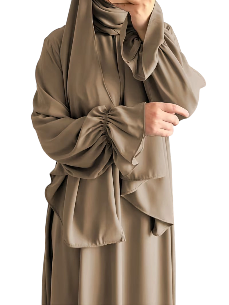 Linen & Loom elegant taupe one-piece abaya with flowing bell sleeves and a matching hijab in a modest, loose fit.