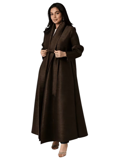 Linen & Loom dark brown pleated cape abaya with a tie-waist, featuring a flowing silhouette and modest design.