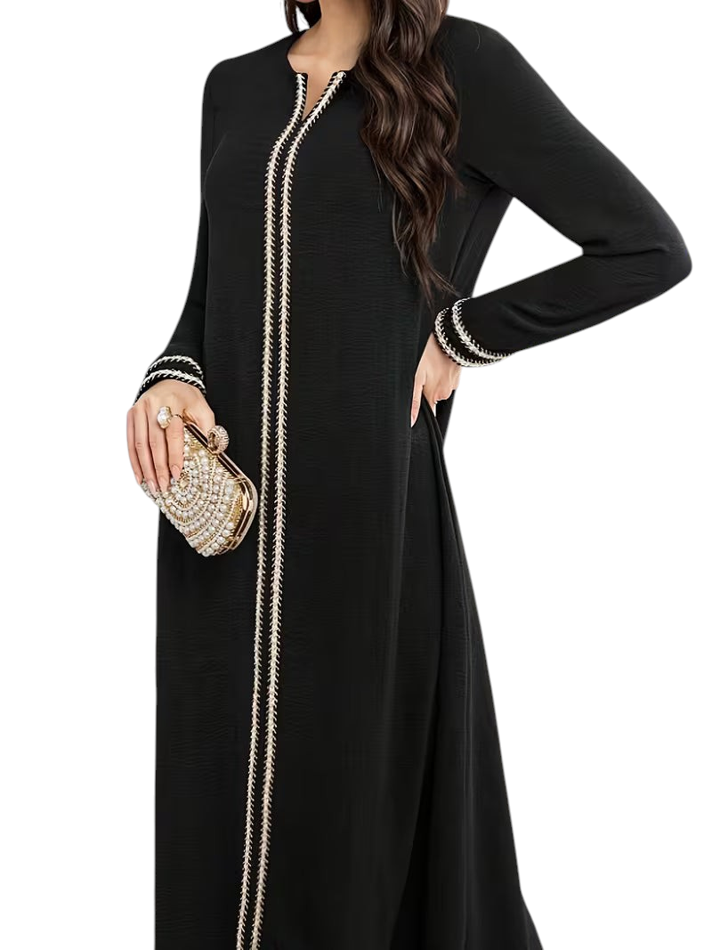 Linen & Loom black Arab-style daily dress with long sleeves, featuring elegant gold trim along the front and cuffs.