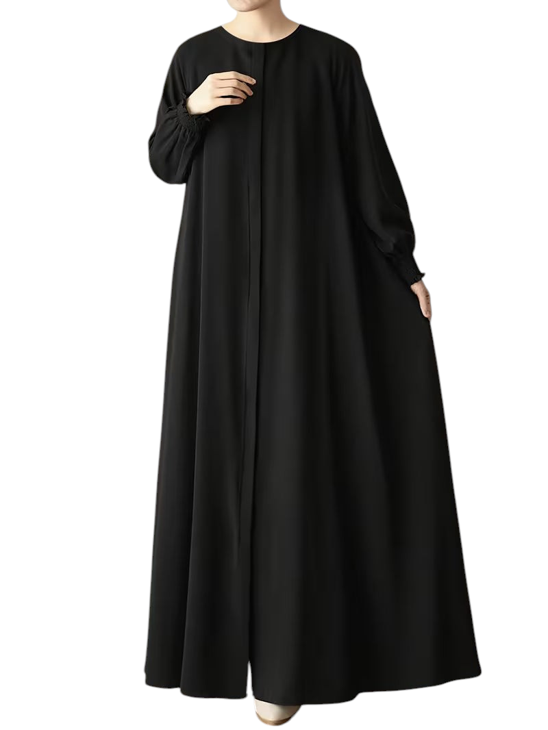 Linen & Loom black solid color abaya with a loose fit, long sleeves, and elegant modest design.