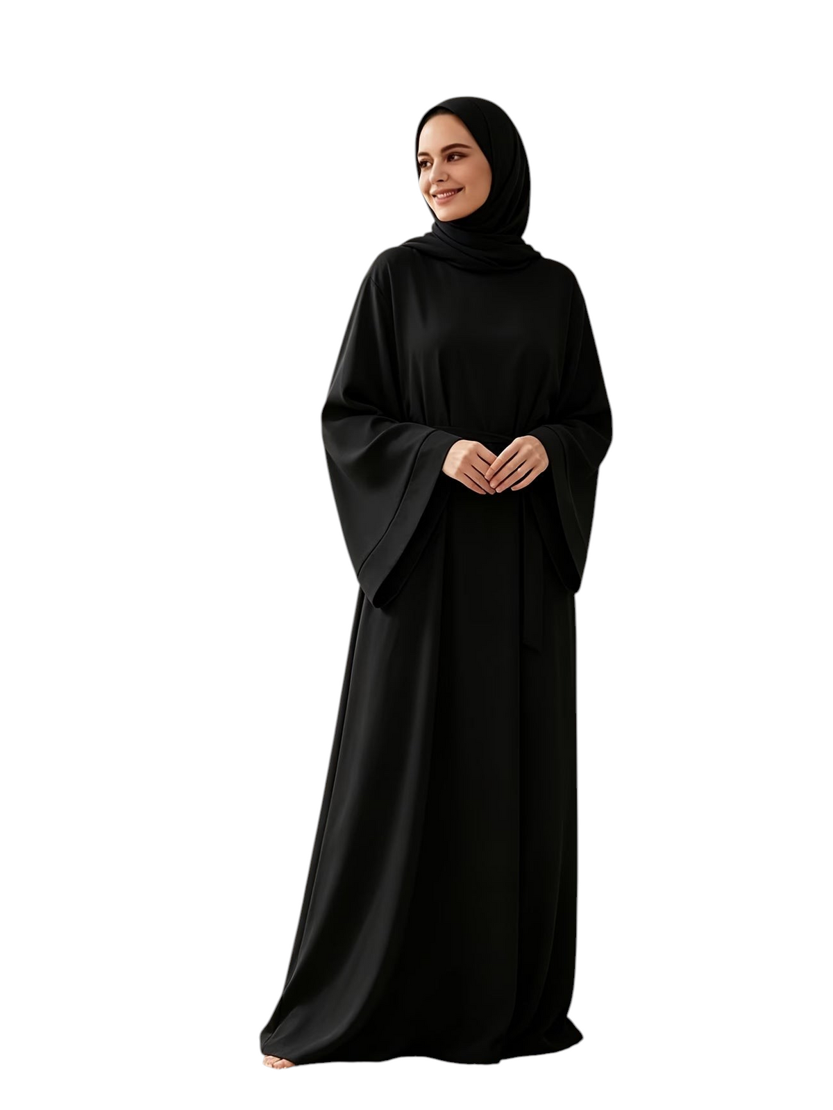 Linen & Loom black wide-sleeve belted abaya worn by a smiling woman in a minimalist living room setting