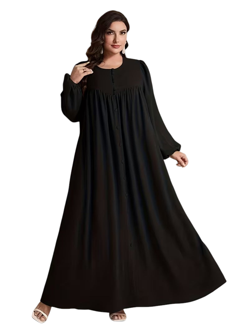 Linen & Loom plus size black long sleeve maxi dress with a round neckline and flowing oversized silhouette.