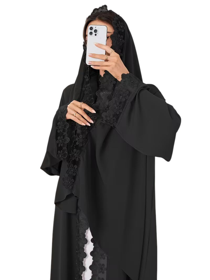 Linen & Loom black 2-piece abaya featuring delicate floral lace trim and intricate beadwork in a flowing modest style.