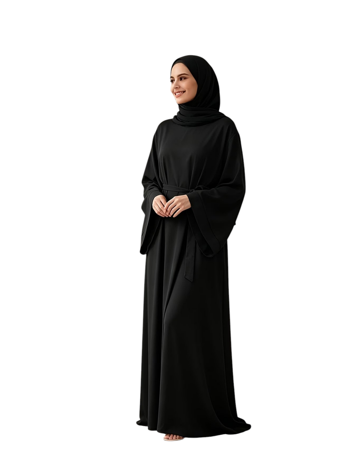 Linen & Loom black wide-sleeve belted abaya worn by a smiling woman in a bright, minimalist living room setting.