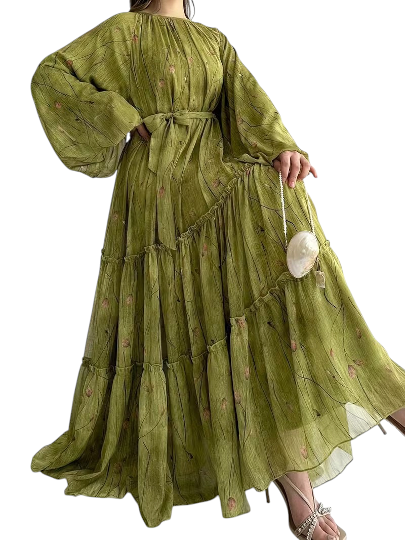 Linen & Loom olive green chiffon abaya dress with floral print, long puff sleeves, tiered skirt, and matching belt.