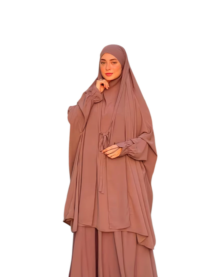 Linen & Loom mauve Arabic-style 2-piece abaya set with lace-up detail and matching headscarf worn by a model.
