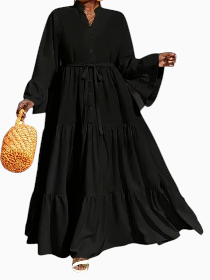 Linen & Loom plus size black midi tunic dress with long sleeves, V-neck, button front, and a tie waist belt.