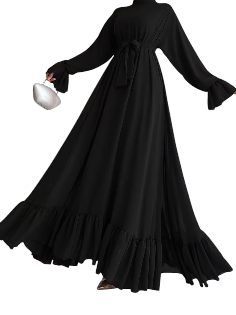 Linen & Loom black chiffon long abaya dress with a flowing skirt, ruffled hem, and tie-waist detail.