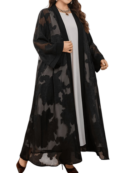 Linen & Loom plus size black chiffon jacquard abaya with floral patterns worn over a white dress for modest style
