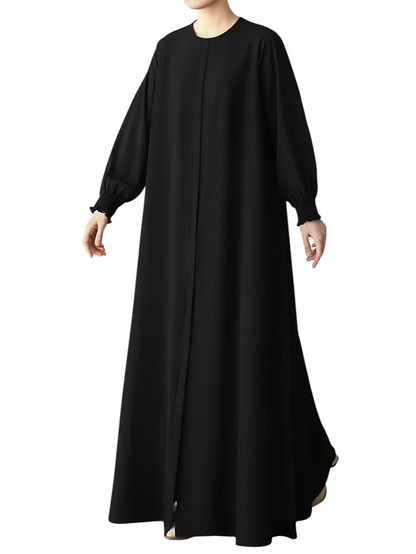 Linen & Loom black modest abaya with long sleeves and a loose, comfortable fit for elegant everyday wear.