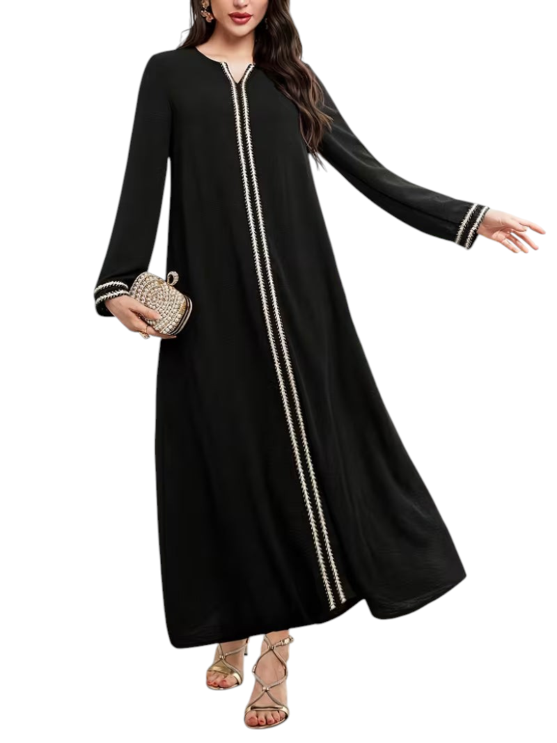 Linen & Loom black Arab-style daily dress with white embroidered trim, long sleeves, and a modest relaxed fit.
