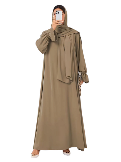 Linen & Loom elegant taupe one-piece abaya with bell sleeves and matching hijab in a modest flowing silhouette