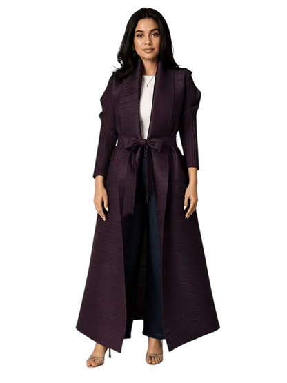 Linen & Loom dark purple pleated cape abaya with a tie-waist, worn over a white top and jeans for a modest look.
