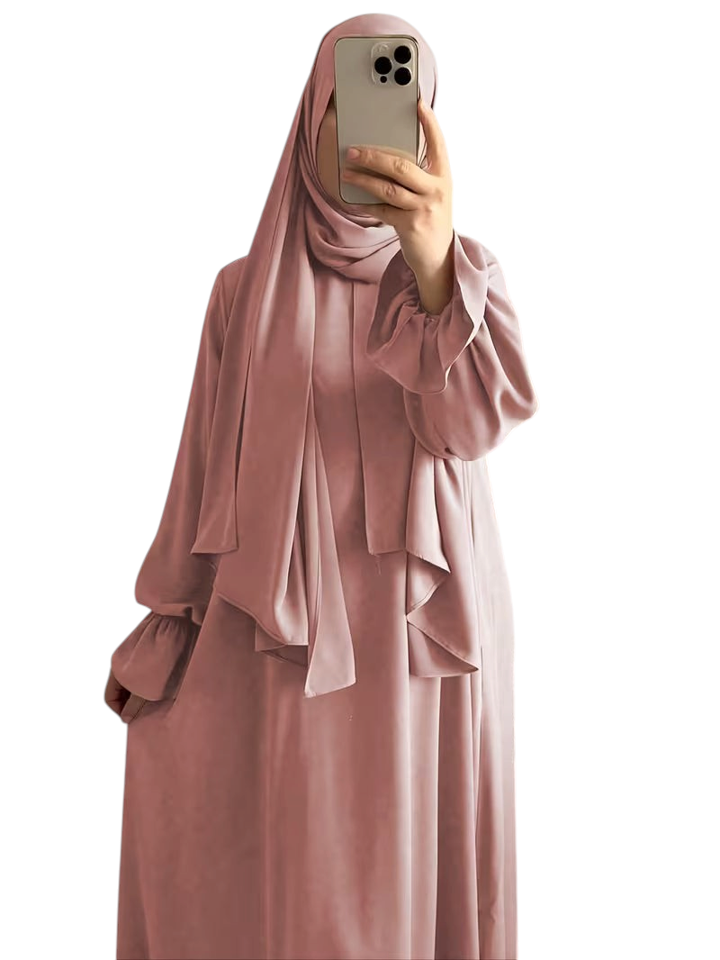 Linen & Loom elegant dusty pink one-piece abaya with bell sleeves and matching hijab in a soft flowing fabric